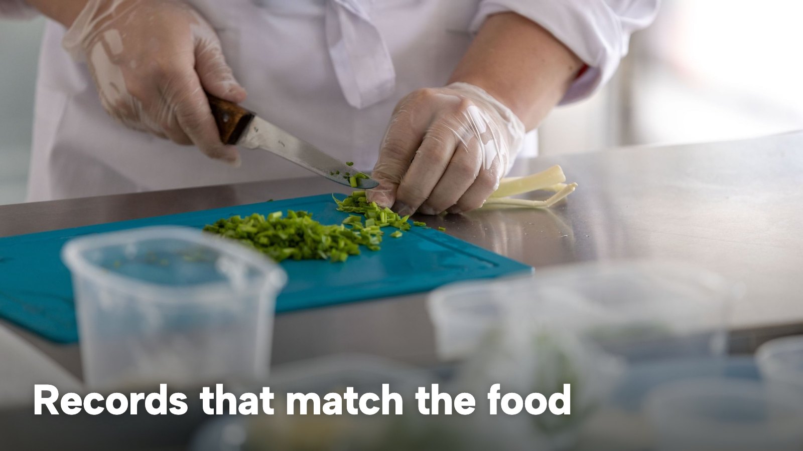 Gloved hands chopping herbs on a blue board beside storage tubs on a steel counter. The image carries the words "Records that match the food".
