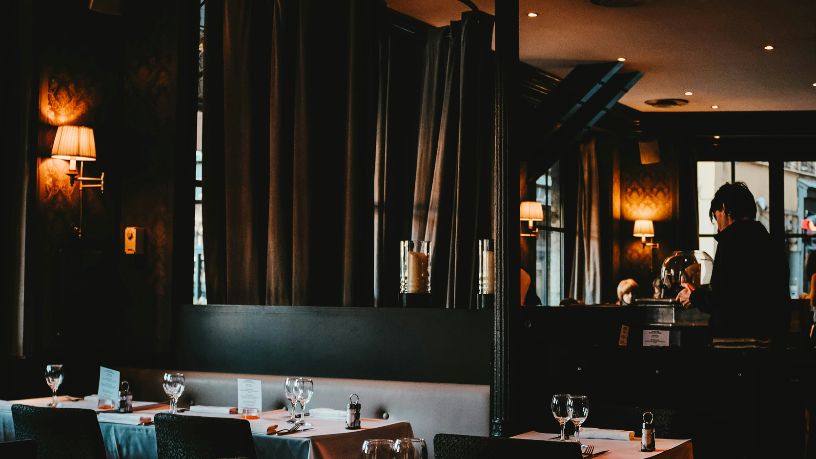 An empty restaurant table ready for the next service decision.
