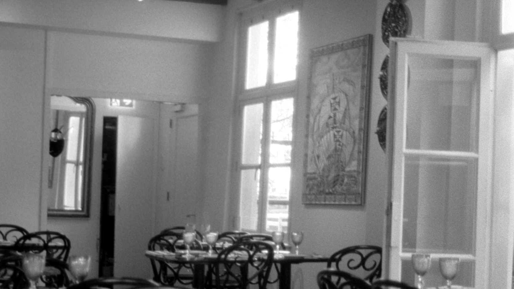 An empty restaurant dining room after an unexpected service change.