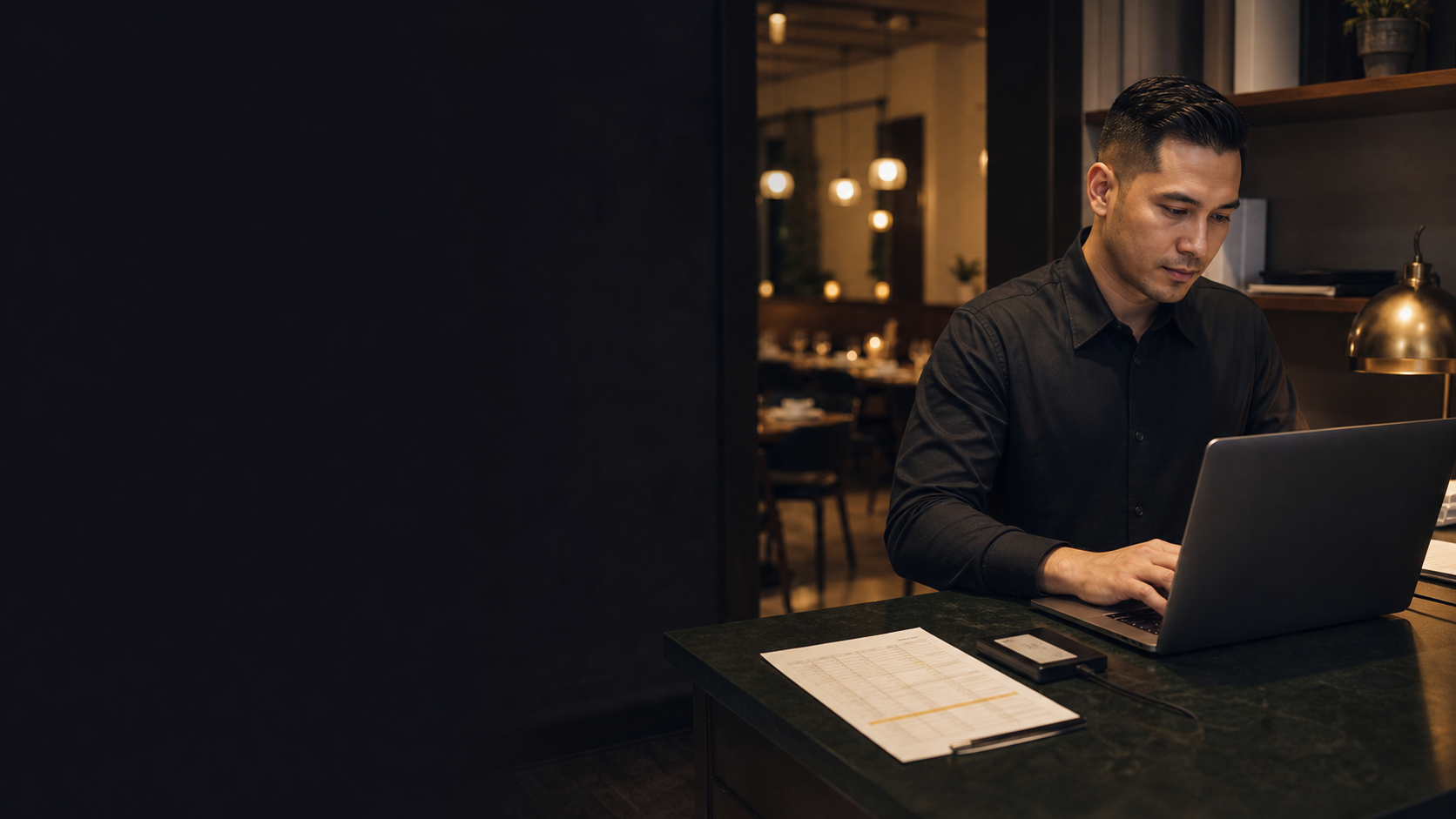 Restaurant manager preparing to verify a guest-list export.