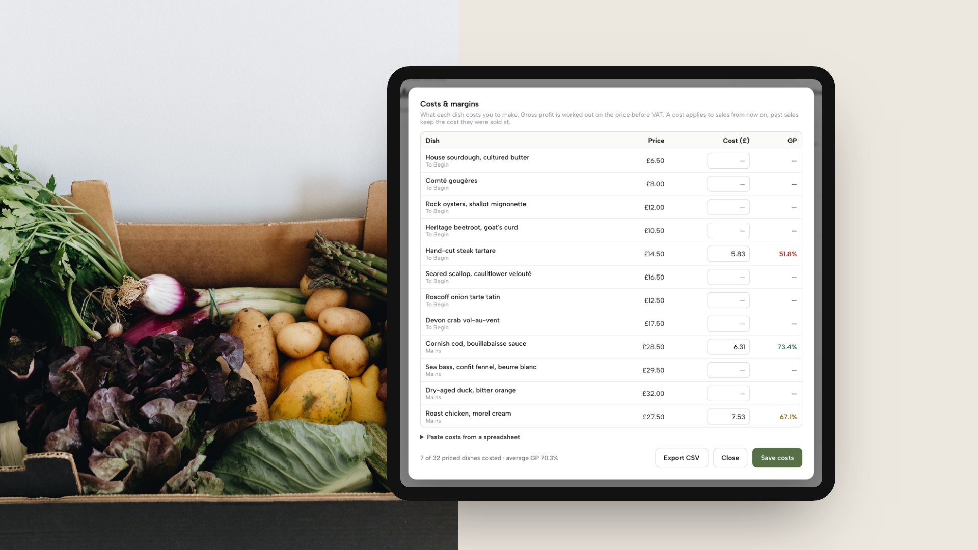 A tablet beside a crate of fresh vegetables, showing the TableSpark Costs and margins table with each dish's price, cost and gross profit.