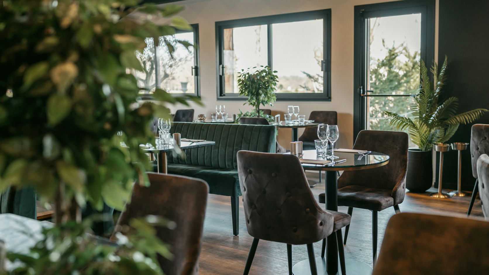 A complete modern restaurant dining room ready for service.