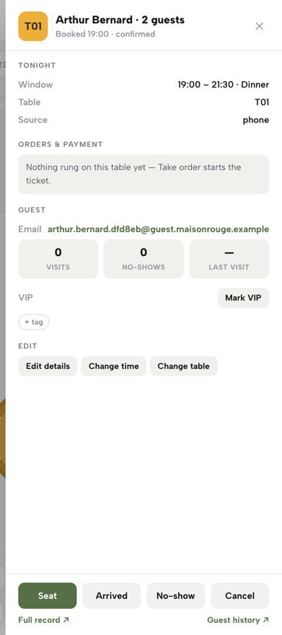 A booking sheet for Arthur Bernard, two guests at table T01: the window, source, guest record and the Seat, Arrived, No-show and Cancel buttons.
