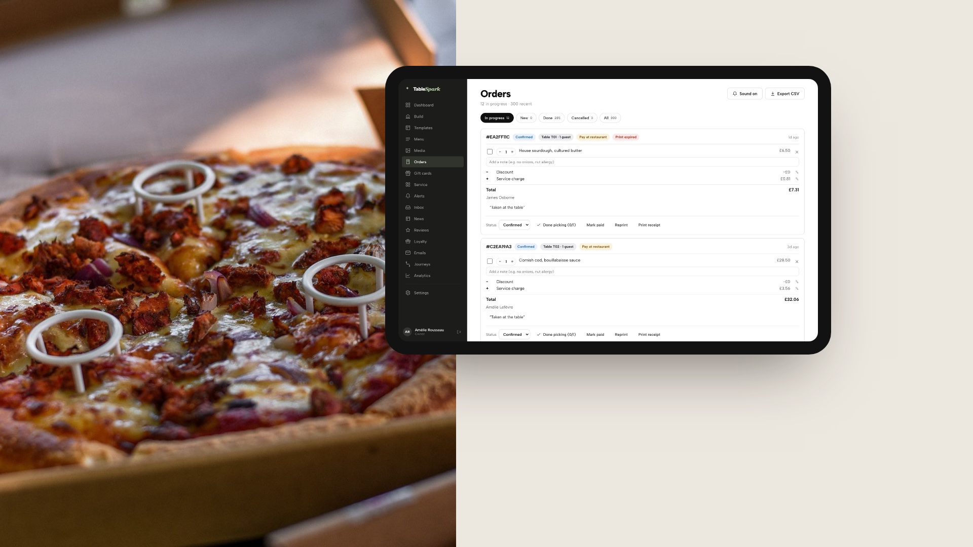 A tablet showing the TableSpark Orders screen for a demo restaurant, with order cards carrying status, payment and line items, beside a photograph of a pizza in its box.